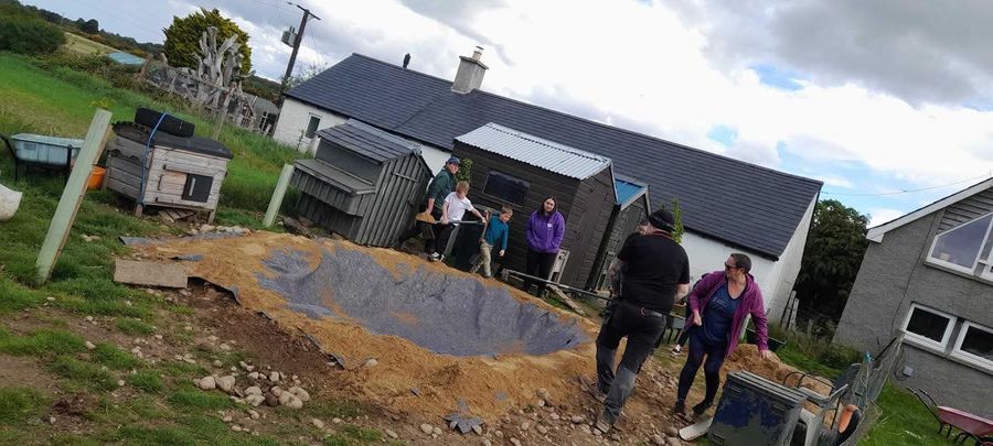 Building a new pond together as a group